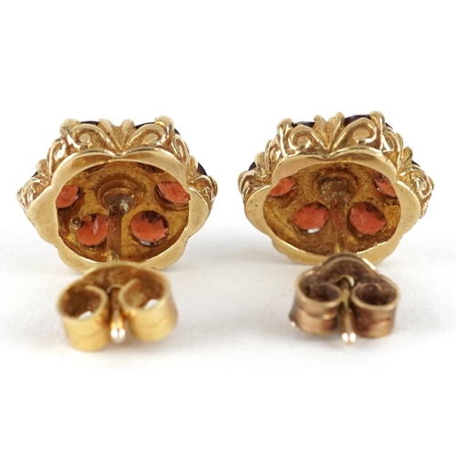 2254 - Pair of 9ct gold Bohemian garnet flower head stud earrings, one butterfly marked 750, 1.1cm in diame... 