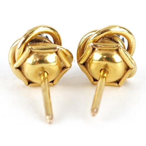 2371 - Pair of 9ct gold sapphire knot design stud earrings, 8.0mm in diameter, 1.7g