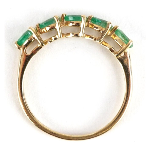 2297 - 10k gold emerald five stone ring, size N, 1.4g