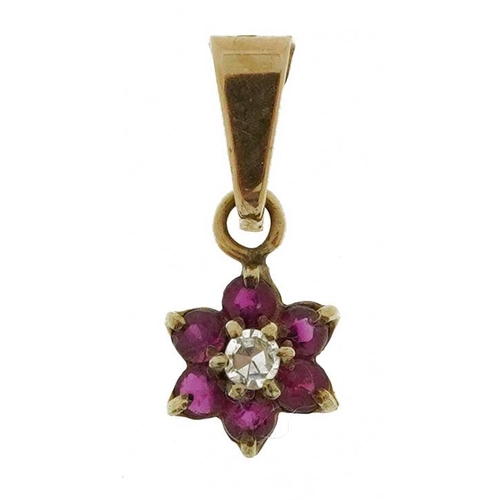 2247 - Unmarked gold diamond and ruby flower head pendant, 1.4cm high, 0.3g