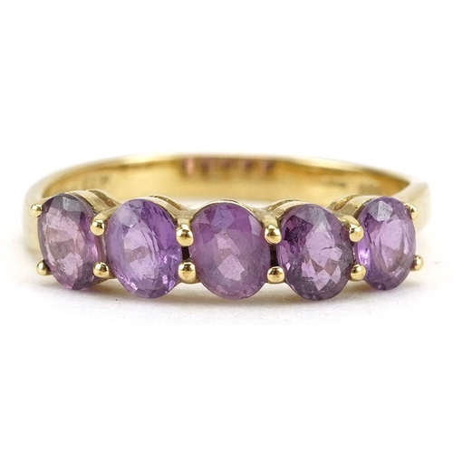 2302 - 10k gold amethyst five stone ring, size N, 1.8g