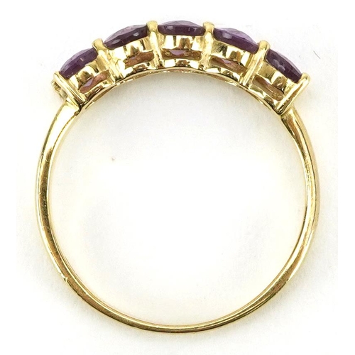 2302 - 10k gold amethyst five stone ring, size N, 1.8g