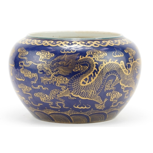 48 - Chinese porcelain powder blue ground jardiniere gilded with dragons chasing the flaming pearl amongs... 