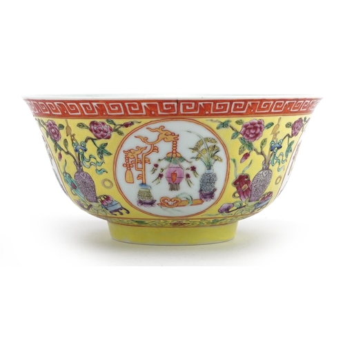 1360 - Chinese porcelain yellow ground bowl hand painted in the famille rose palette with panels of lucky o... 