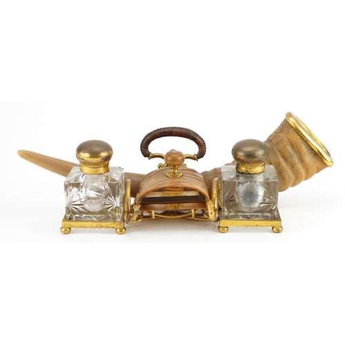 263 - Edwardian gilt brass and horn desk stand with two glass inkwells engraved To the indefatigable and e... 