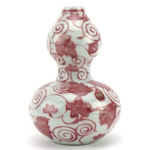 365 - Chinese porcelain iron red double gourd vase hand painted with flowers amongst scrolling foliage, 19... 