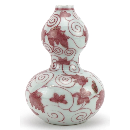 365 - Chinese porcelain iron red double gourd vase hand painted with flowers amongst scrolling foliage, 19... 