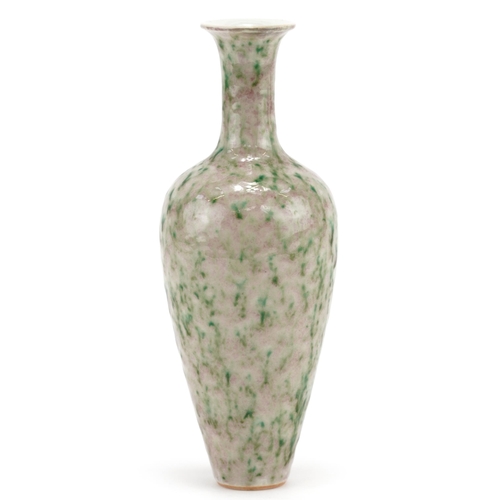 323 - Chinese porcelain vase having a spotted green and red glaze, six figure character marks to the base