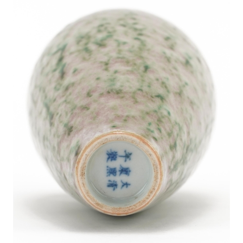 323 - Chinese porcelain vase having a spotted green and red glaze, six figure character marks to the base