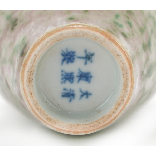 323 - Chinese porcelain vase having a spotted green and red glaze, six figure character marks to the base