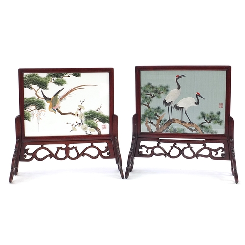 1195 - Pair of Chinese hardwood table screens with silk panels finely embroidered with birds of paradise an... 