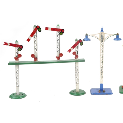 1415 - Collection of Hornby O gauge tinplate model railway trackside signals, the largest 32cm in length