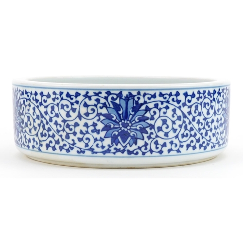 1327 - Chinese blue and white porcelain bowl hand painted with flowers, six figure character marks to the b... 