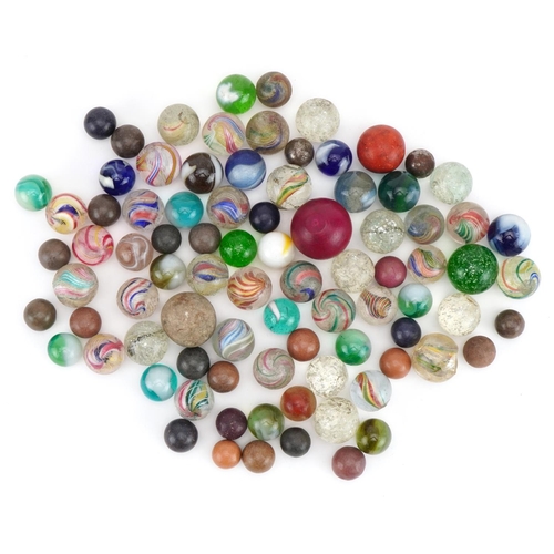 1473 - Collection of 19th century and later glass marbles including latticinio examples, the largest approx... 