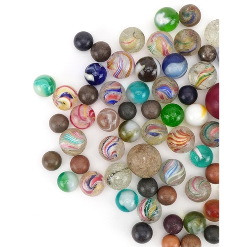 1473 - Collection of 19th century and later glass marbles including latticinio examples, the largest approx... 