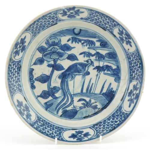 Chinese blue and white porcelain Binh Thuan wreck shallow dish hand painted with crane amongst flowers, 27cm in diameter