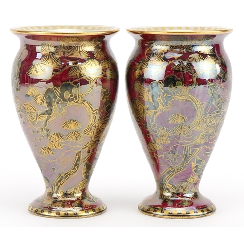 20 - Daisy Makeig-Jones for Wedgwood, pair of Fairyland lustre baluster vases decorated with Firbolgs pla... 