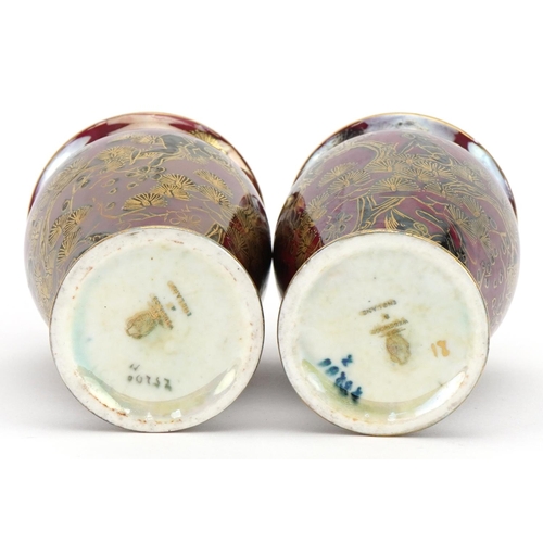20 - Daisy Makeig-Jones for Wedgwood, pair of Fairyland lustre baluster vases decorated with Firbolgs pla... 