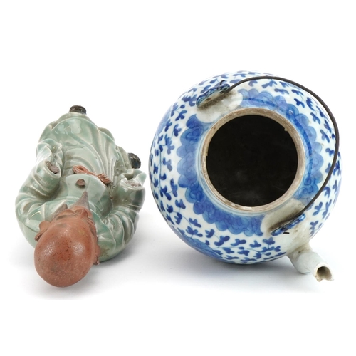 1231 - Chinese blue and white porcelain teapot and a celadon glazed figure, the largest 30cm high