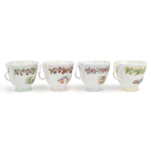 1176 - Four Royal Doulton Four Seasons cups with saucers, each cup 8cm high