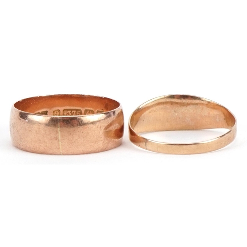2027 - Two Victorian and later 9ct rose gold rings comprising wedding band and Gypsy ring set with a red st... 