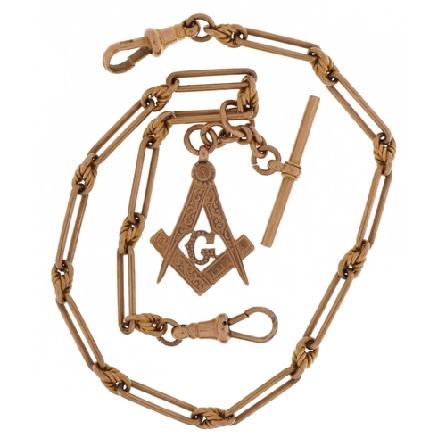 2034 - 9ct rose gold watch chain with masonic charm, T bar and dog clips, 38cm in length, 32.3g