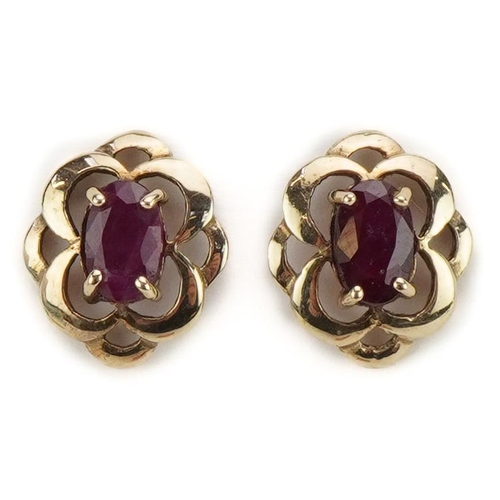 2327 - Pair of unmarked gold ruby stud earrings, the butterflies marked 9ct, 1.1cm high, 1.1g