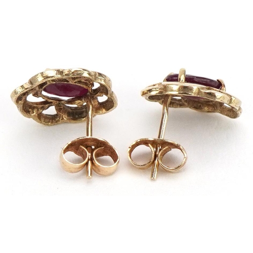 2327 - Pair of unmarked gold ruby stud earrings, the butterflies marked 9ct, 1.1cm high, 1.1g