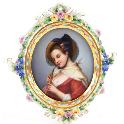 88 - Pair of continental oval porcelain plaques hand painted with maidens housed in floral encrusted porc... 