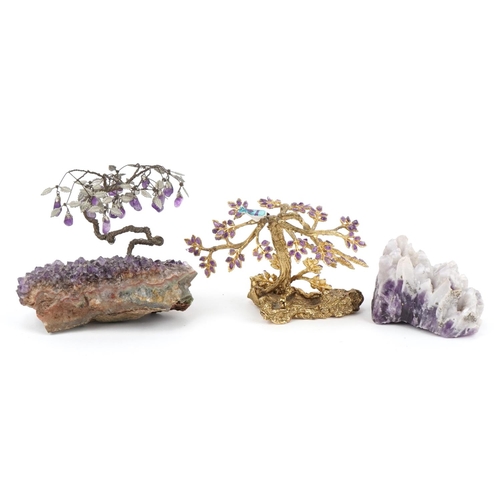 1323 - Two amethyst and gilt metal bonsai trees and a amethyst geode, the largest 14cm wide