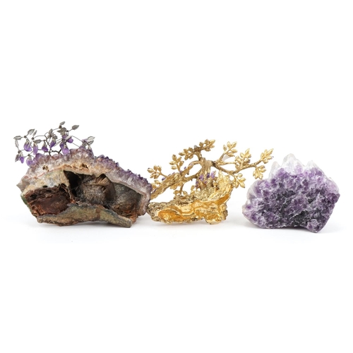 1323 - Two amethyst and gilt metal bonsai trees and a amethyst geode, the largest 14cm wide