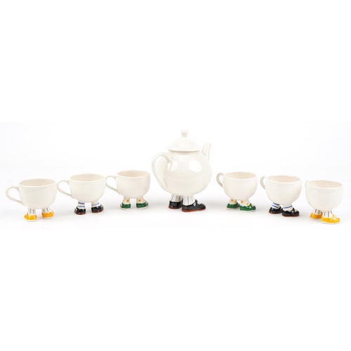 352 - Carltonware Walking teaware comprising teapot and six cups, the largest 21cm in length