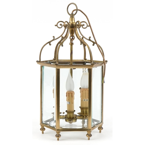 113 - Good quality Gothic style brass hanging three branch lanterns with bevelled glass panels, 55.5cm hig... 