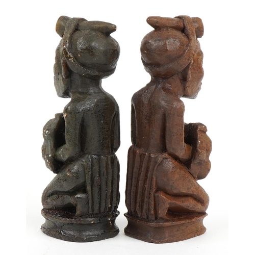 1438 - South African carved stone figural chess set with board, Rhodesia paper label to the base of the che... 