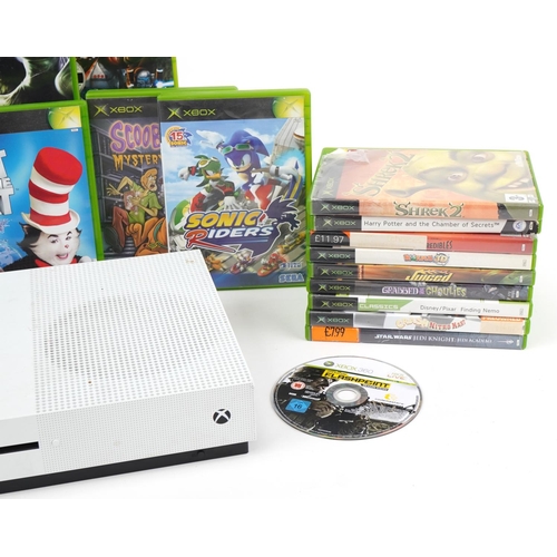 1448 - Xbox One S games console with a collection of Xbox games