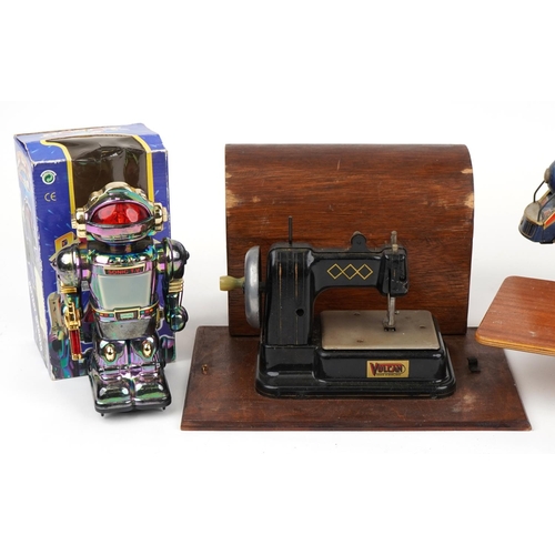 1434 - Vintage toys including a Vulcan sewing machine, Japanese tinplate Golden Falcon locomotive and a Tri... 