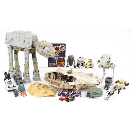 1449 - Vintage and later Star Wars toys including a 1979 Millennium Falcon by Kenner and a 1981 AT AT by Lu... 