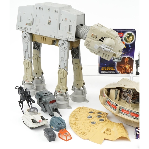 1449 - Vintage and later Star Wars toys including a 1979 Millennium Falcon by Kenner and a 1981 AT AT by Lu... 