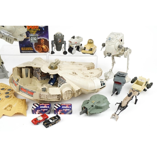 1449 - Vintage and later Star Wars toys including a 1979 Millennium Falcon by Kenner and a 1981 AT AT by Lu... 