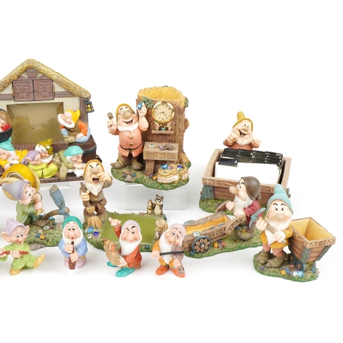 1258 - Collection of Walt Disney porcelain Snow White and the Seven Dwarfs figures including snow globe pho... 