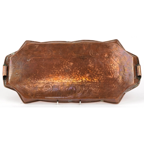 148 - Art Nouveau copper tray engraved with stylised motifs, 49cm wide