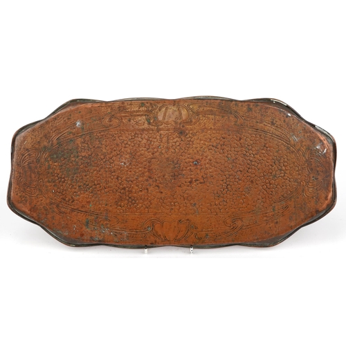 308 - Art Nouveau copper tray engraved with stylised motifs, 57cm wide