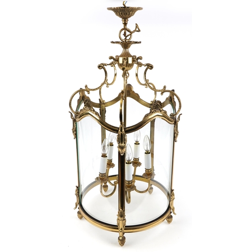 112 - Good quality Rococo style brass five branch hanging lantern with C scrolls and glass panels, 84cm hi... 