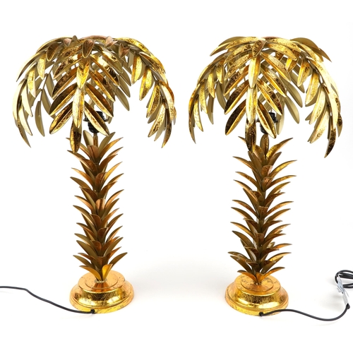 1144 - Pair of Hollywood Regency style gilt metal table lamps in the form of palm trees, each 75cm high