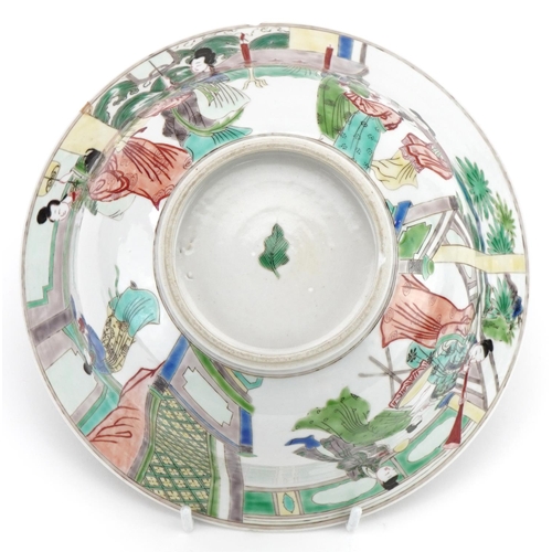 1297 - Chinese bowl hand painted in the famille verte palette with figures in a palace setting, Kangxi leaf... 