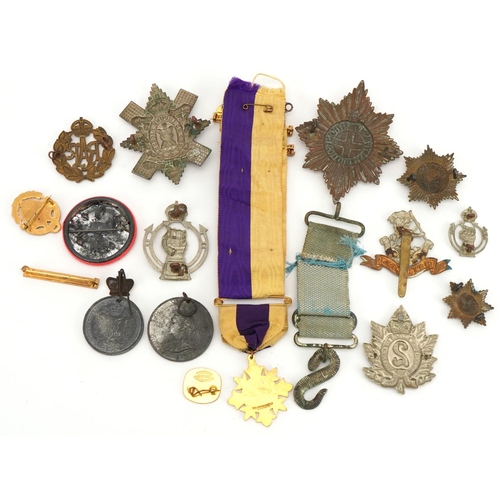 1322 - Military and commemorative interest sundry items including The West Riding cap badge and Queen's Own... 