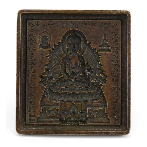 1238 - Tibetan patinated bronze Buddha mould, 12cm high