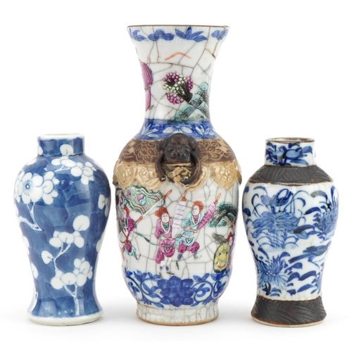 243 - Three Chinese porcelain vases including two baluster examples, one hand painted with prunus flowers,... 