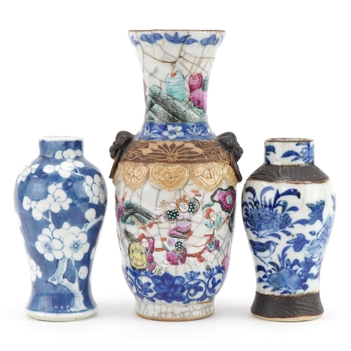 243 - Three Chinese porcelain vases including two baluster examples, one hand painted with prunus flowers,... 