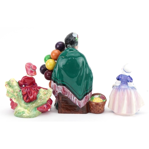 1186 - Three Royal Doulton figurines comprising The Old Balloon Seller HN1315, Lydia HN1908 and Dinky Do HN... 